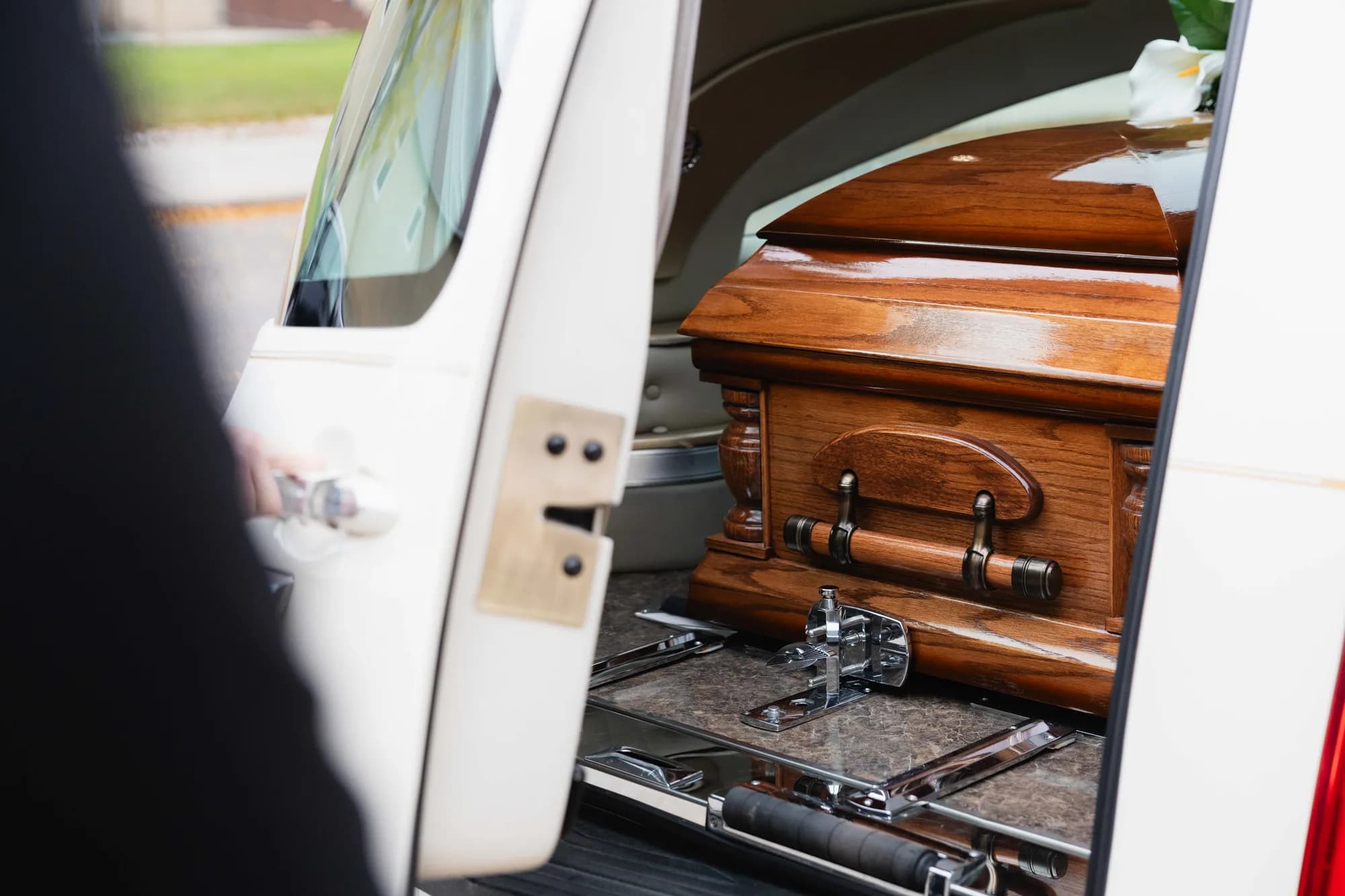A casket in the open hearse outside Generations in Lethbridge.
