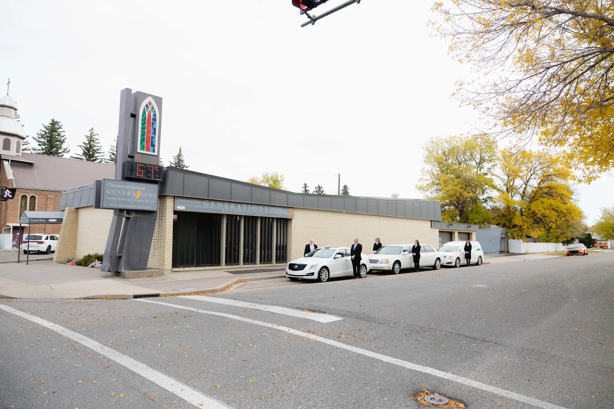 Generations Funeral Home & Crematorium on 13 Street North in Lethbridge, the fleet and staff waiting outside